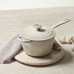 Le Creuset 2.25 Qt. Signature Enameled Cast Iron Saucepan With Stainless Steel Knob | Meringue White -Stovetop Tea Kettles Shop mer1 1