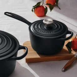 Le Creuset 1.75 Qt. Signature Enameled Cast Iron Saucepan With Stainless Steel Knob | Licorice 9 Le Creuset 1.75 Qt. Signature Enameled Cast Iron Saucepan With Stainless Steel Knob | Licorice -Stovetop Tea Kettles Shop rs11532 lca q2 licoricegroup 0253 ret lpr2